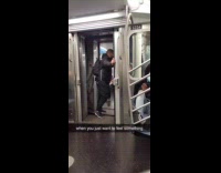 Guy needs fresh air on the subway