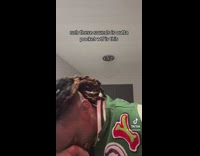 Guy in green letterman records himself laugh