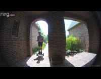 Guy falls off electric segway in front of house 