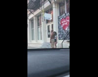 Grey shirt girl black lives matter heart