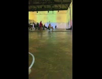 Blonde Woman in Holographic Clothing Gets Photo Taken