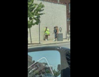 Woman oversized yellow green dress dance sidewalk