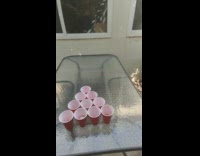 Guy plays beer pong alone day four  