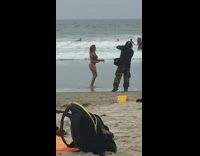 woman bikini jumping low beach