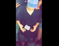 Guy in blue hat makes card spin in air crowd goes crazy 3