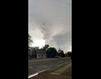 Large clouds and lightning over neighborhood