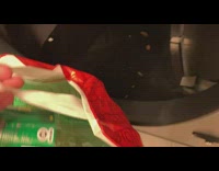 Person put cans and bottles in recycling machine