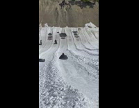 Kid saved from being hit ice slide