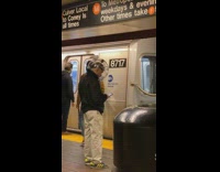 Black jacket guy bubble helmet subway station 
