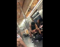 Man massage girlfriend foot during train ride