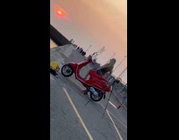 Woman photoshoot with scooter at the docks