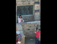 Couple weird makeup hold baby green window