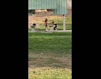 Red shirt black skirt girl table park 