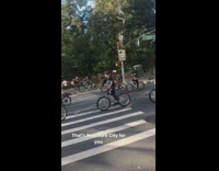 Large group of people on electric bikes