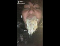 Guy bites cattail and it explodes in his mouth