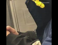 man lighting incense on train 