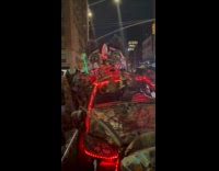 Customized cars for Halloween parked on street