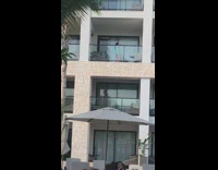 girl light blue shirt tiktok balcony