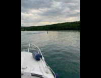 Man surf surfboard pull speedboat drown