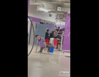 Guy mopping slips and falls on floor