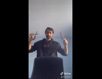 Freeze frame guy cuts his own hair 