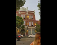 White dog on ledge of apartment building scares everyone 
