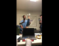 Cheer fiji water bottle flip onto shoe