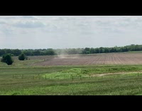 Small Dust Tornadoes Form on Empty Field