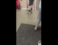 Girl roller skates through trader joes
