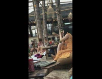 Girls filming mukbang at hotel beach restaurant