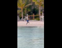 Man and woman tiktok video at beach Part 2