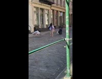 Girl large pink fur coat photo shoot empty alley