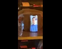 Woman dance in bar video call guy