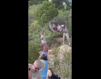 Woman brown oversized shirt silly dance trail