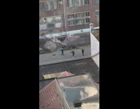 Man in cyan and black jacket rap on the alley