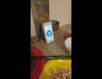 Girl spins wheel adds biscuit to pizza