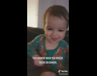 Baby poses for camera