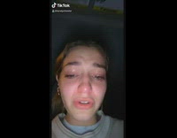 Girl car red makeup crying baby sitting