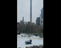Trump zamboni cleans outdoor ice skating rink