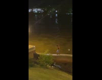 Guy dance on ledge punch air night