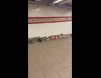 Lined up toys with lamps subway walkway