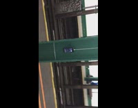 Phone Rings Hanging Upside Down at Subway 