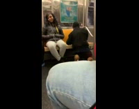 Man makes a beat with pencil on seat and raps on subway train