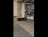 Woman cover mouth knitted coat tree lights