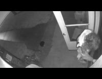 Woman drops bottle and falls while trying to enter house 