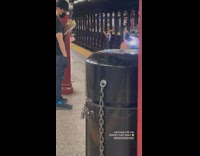 Toy placed on the trash bin for a photoshoot at subway