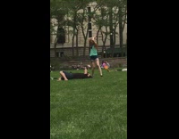 Girl green top  spin flail ball park