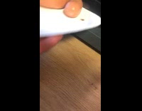 Red microwave on fire after trying to cook sausages hotdog