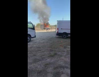 Truck in flames with loud and long horn sound