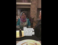 Two grandmas communicate using hands 